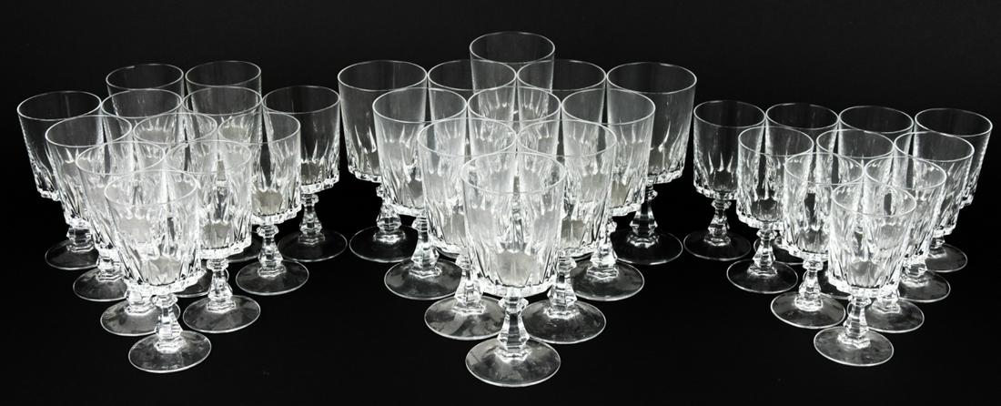 Set Crystal Stemware: Set Crystal Stemware. Including 11 red wine glasses, 12 white wine glasses, 10 aperitif glasses. Unmarked crystal. Largest glass measures 6.25 inches high by 3 inches in diameter.