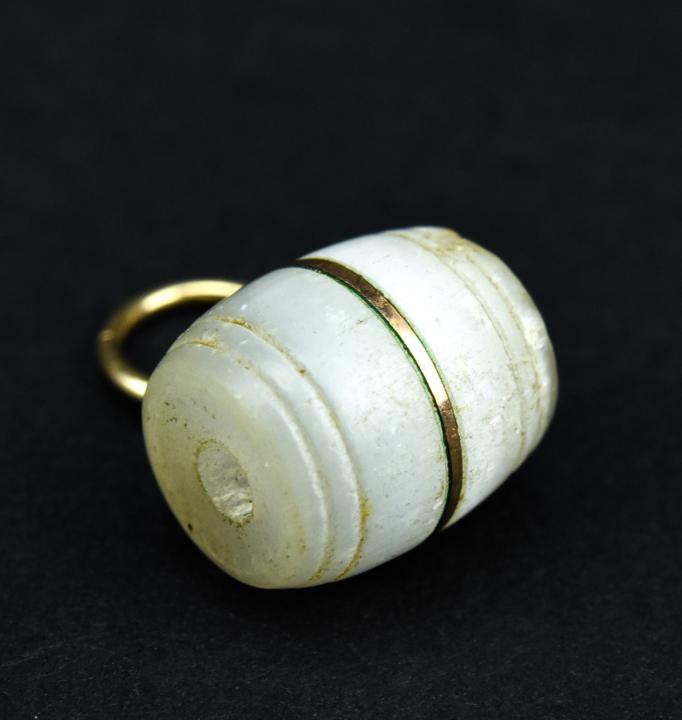 Antique 19th C Feldspar Moonstone Barrel Pendant: Antique 19th C Feldspar Moonstone Barrel Pendant. Necklace pendant/watch fob/charm carved to resemble a barrel. Measures just under 0.75 inches in length.