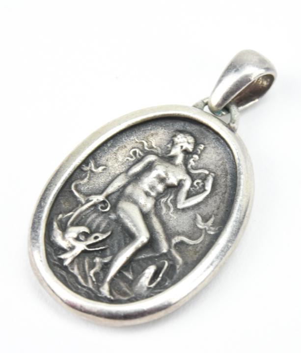 Antique 950 Sterling Nude Sea Siren Pendant Charm: Antique 950 Sterling Nude Sea Siren Pendant Charm. Ornate and figural necklace pendant hallmarked 950 of a mythological siren. Measures 1.5 inches in length.