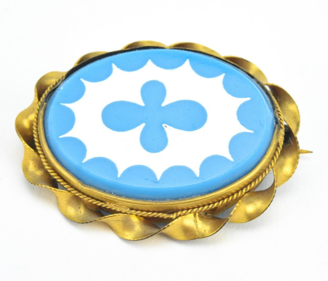 Antique 19th C Persian Turquoise Art Glass Brooch: Antique 19th C Persian Turquoise Art Glass Brooch. Gold filled frame with art glass / opaline glass panel. Measures 1.75 inches in length.