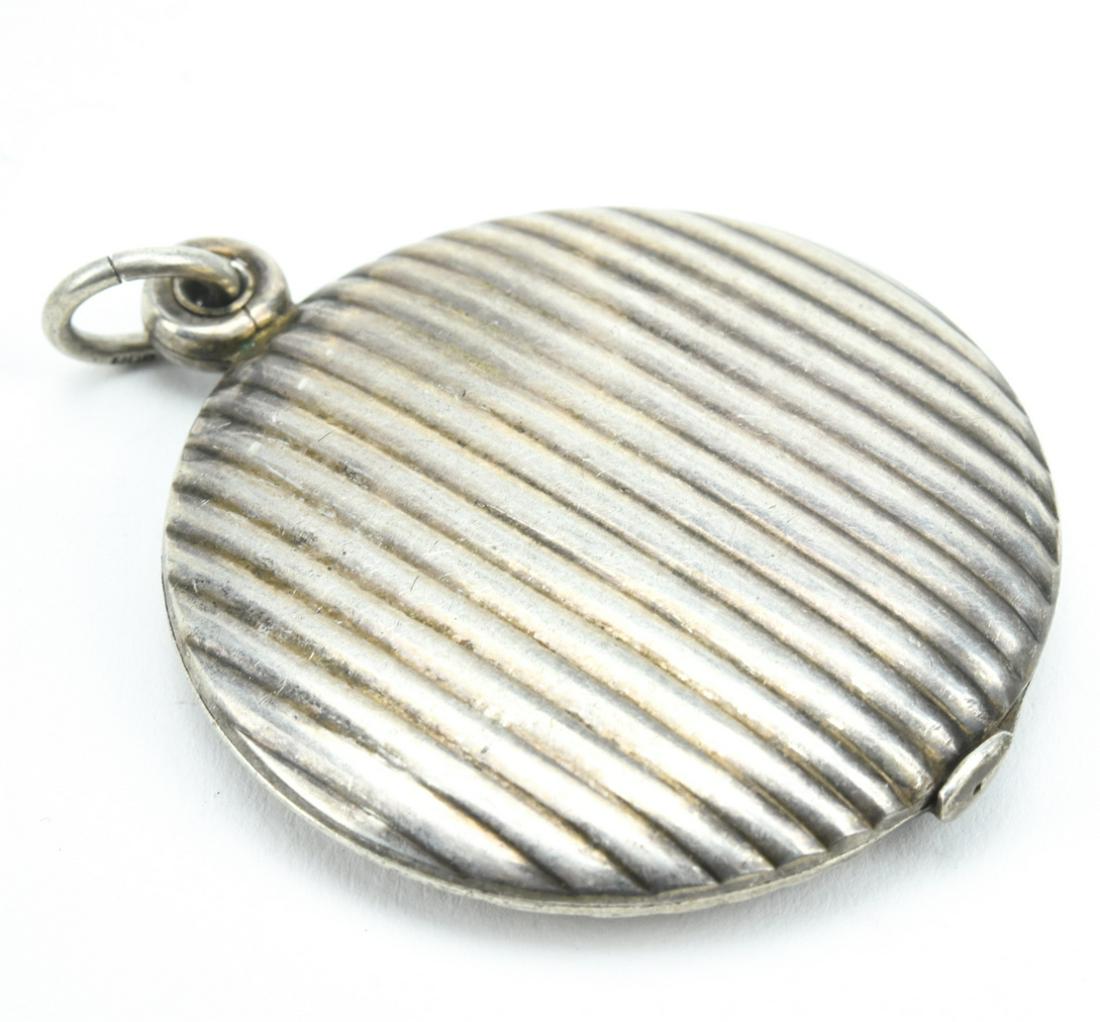 Antique C 1900 Ribbed Design 800 Silver Locket: Antique C 1900 Ribbed Design 800 Silver Locket Necklace Pendant. Interior with photo and mirror. Measures 2.25 inches in length. Bail is hallmarked 800.