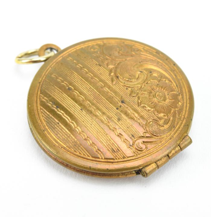 Antique Art Deco Floral Motif Locket Pendant: Antique Art Deco Floral Motif Locket Necklace Pendant. Measures 1.5 inches in length.