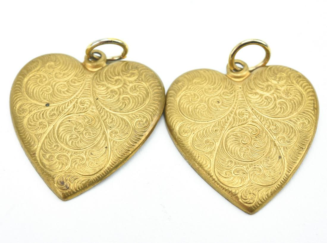 Pair Antique Ormolu Heart Form Necklace Pendants: Pair Antique Ormolu Heart Form Necklace Pendants. Each measures just over 1.25 inches in length.