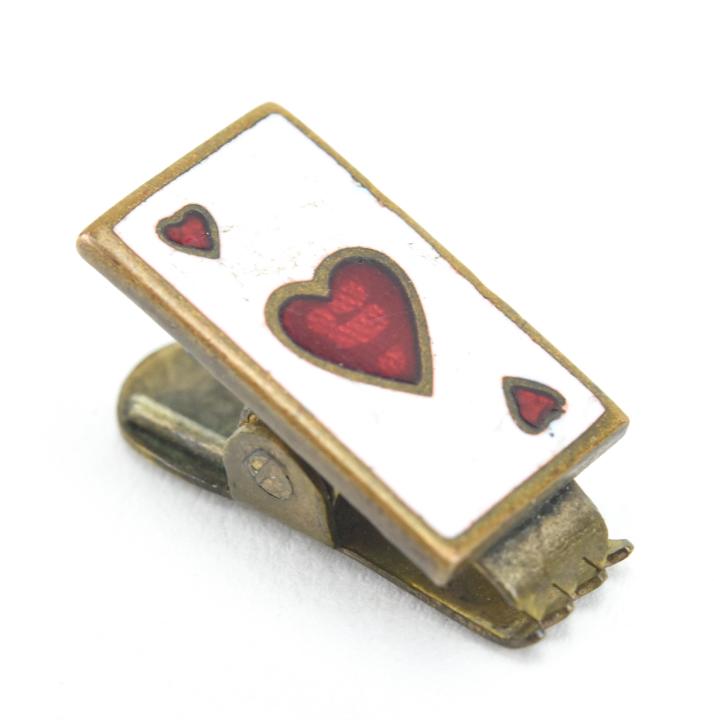 Antique Enamel Heart Motif Card Lingerie Clip: Antique Heart Motif Playing Card Enamel Card Lingerie Clip. Design with playing card house of hearts. Measures .75 of an inch in length.