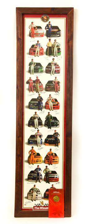 Signed Nascar Winston All Star Race 1991 Poster: Framed Signed Nascar The Winston 1991 20th Anniversary All Star Race Poster & Commemorative Coin. Poster measures 49 inches high x 11 inches wide. Frame measures 52.25 inches high x 14.25 inches wide.