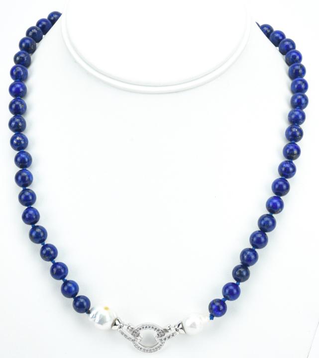 Lapis Lazuli Necklace w Cultured Baroque Pearls: Lapis Lazuli Necklace w High Luster Cultured Baroque Pearls. Hand knotted on blue silk thread and set with an Art Deco style pave set clasp / pendant. Beads are 6mm in diameter. Necklace measures 20 i
