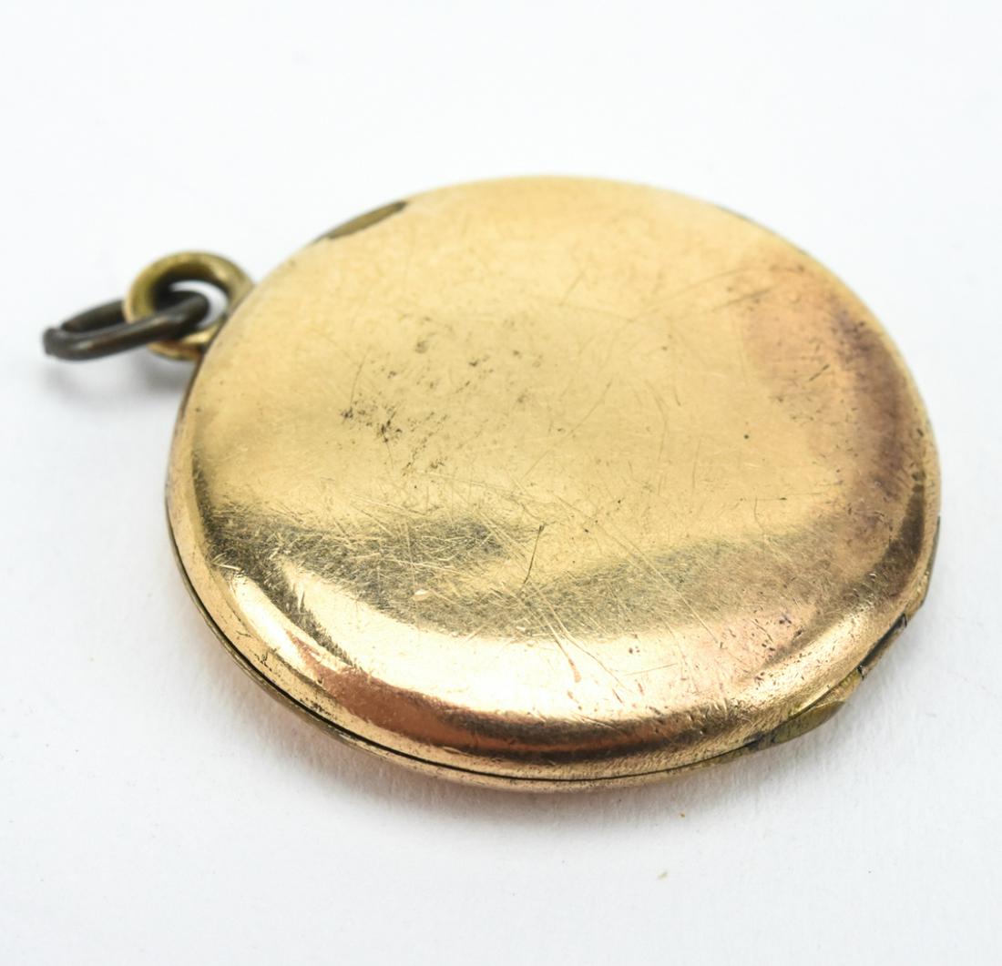 Antique 19th C Gold Filled Round Locket Pendant: Antique 19th C Gold Filled Round Locket Pendant. Measures 1.25 inches in length.