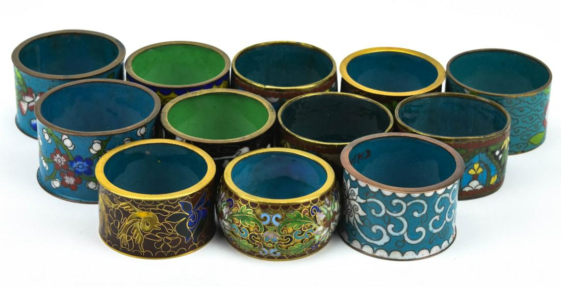 Twelve Chinese Cloisonne Enamel Napkin Rings: Twelve Chinese Cloisonne Enamel Napkin Rings. Measures 2 inches in diameter. Condition This sale is online only - no public preview or live in house sale will be held - please ask for additional photo