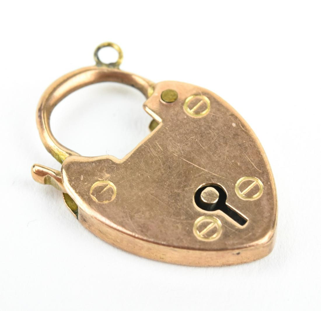 Antique English 9kt Yellow Gold Heart Padlock: Antique English 9kt Yellow Gold Heart Padlock. Hallmarked. Necklace pendant / charm / clasp. Measures 1 inch in length.