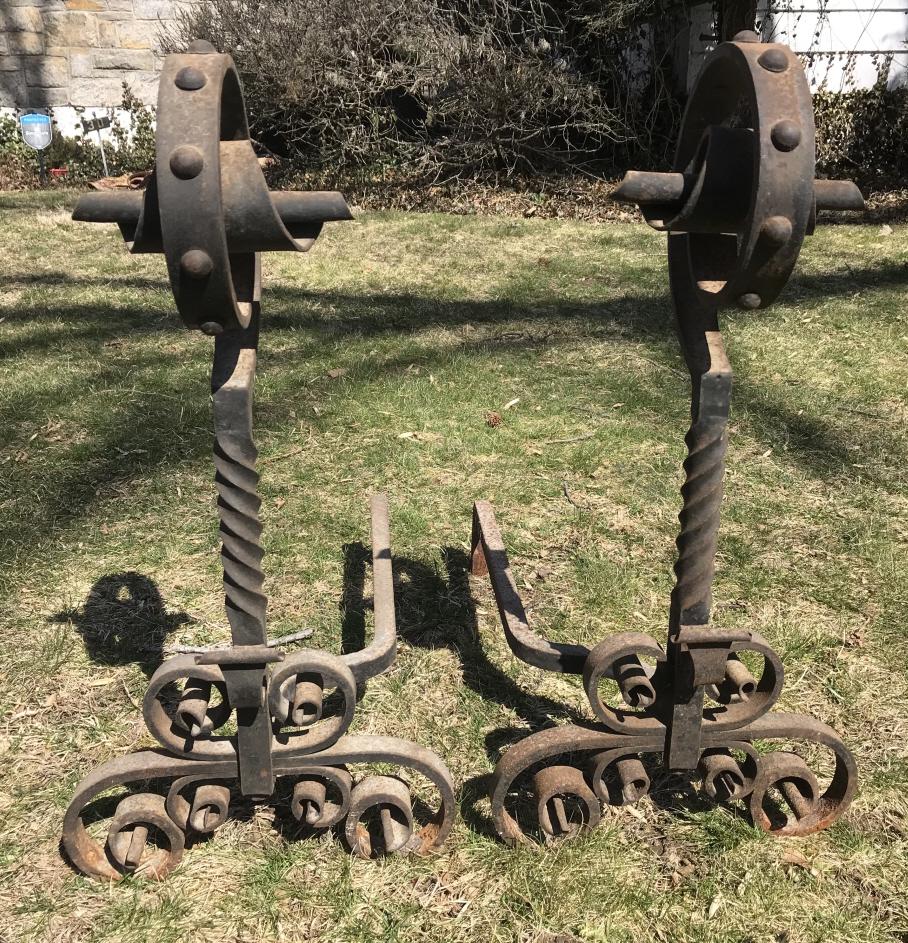 Arts & Crafts Style Wrought Iron Andirons: Arts & Crafts Style Wrought Iron Andirons. Measures 27 inches high x 13.5 inches wide x 25 inches deep.