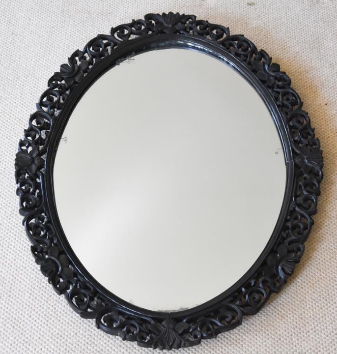 Antique Chinese Carved Hard Wood Mirror: Antique Chinese Carved Hard Wood Mirror. Hand carved frame. Measures 33 inches high x 25.5 inches wide. Estate inventory #11.