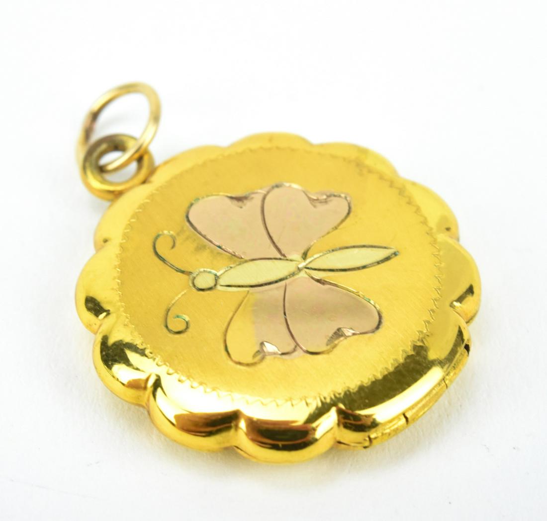 Vintage 2 Tone Gold Filled Butterfly Locket: Vintage 2 Tone Gold Filled Butterfly Locket. Butterfly motif locket / pendant. Measures 1.25 inches in length.