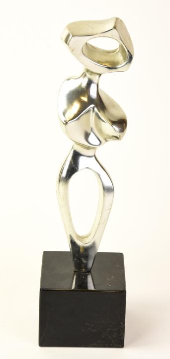 MCM Abstract Nude Silver Tone Statue Marble Base: MCM Abstract Nude Silver Tone Statue on Marble Base. Measures 15 inches high x 4 inches wide x 4 inches deep at base.