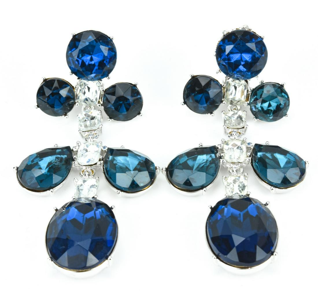 Vintage Kenneth Jay Lane Clip on Earrings: Vintage Kenneth Jay Lane Clip on Earrings. Costume jewelry clip on earrings with sapphire paste and clear rhinestones. Includes original box. Measures 3.5 inches in length.