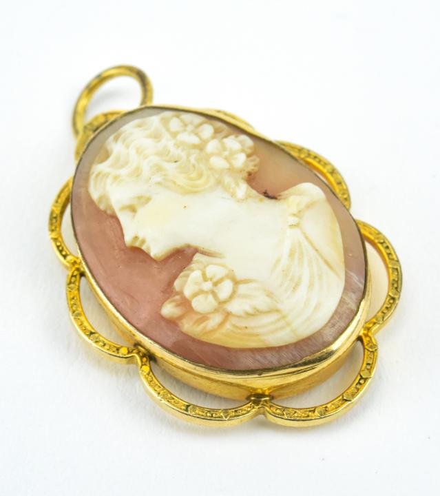 Estate Locket Necklace Pendant w Carved Cameo: Estate Locket Necklace Pendant w Carved Cameo. Gold filled. Hand carved natural shell cameo front. Measures 1.5 inches in length.