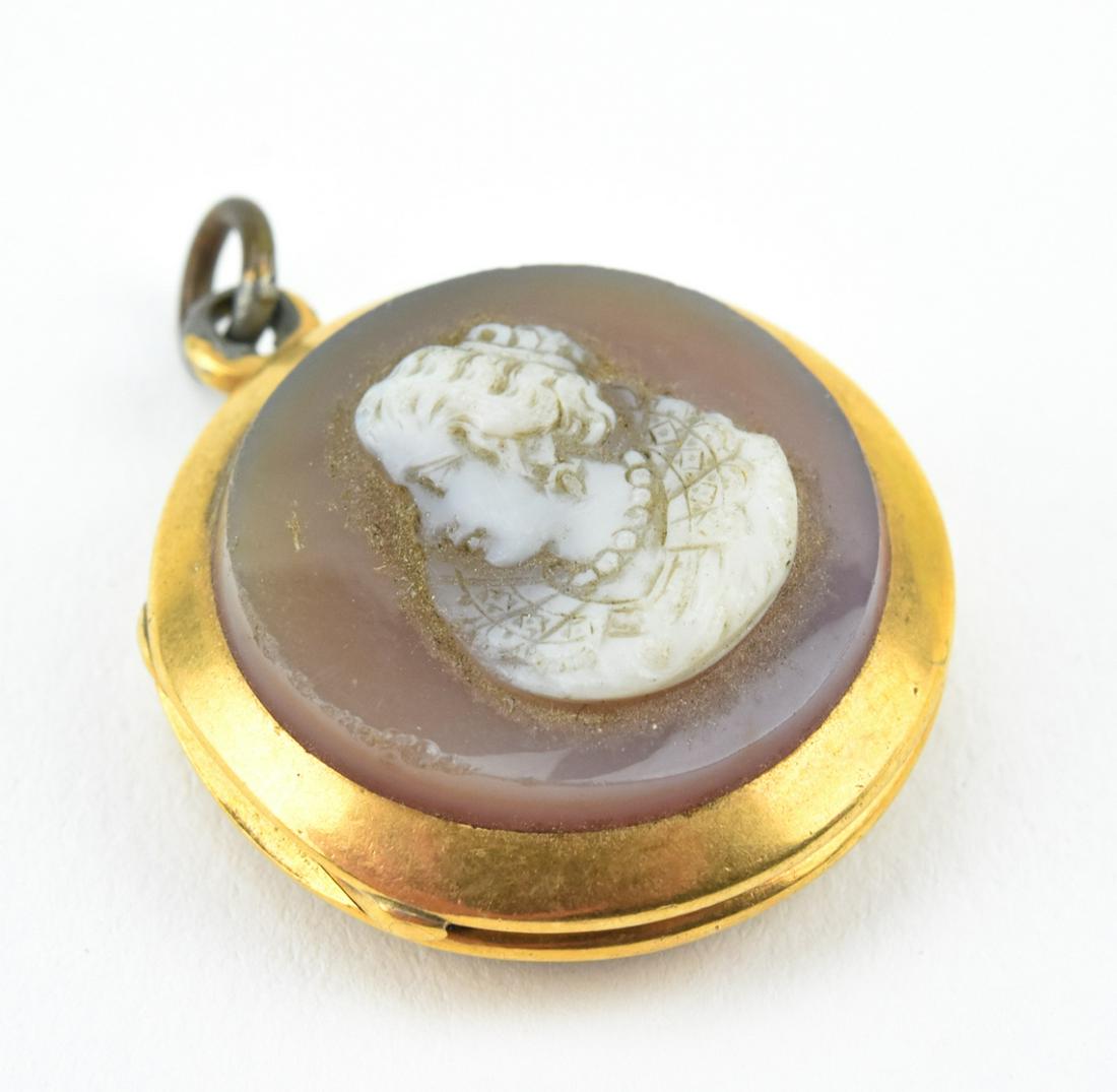Antique 19th C Sardonyx Cameo & Bloodstone Locket: Antique 19th C Sardonyx Cameo & Bloodstone Locket Necklace Pendant. Hand carved portrait in hardstone of an Elizabethan style dress on the front, bloodstone heliotrope panel on back. Measures 1.25 inc