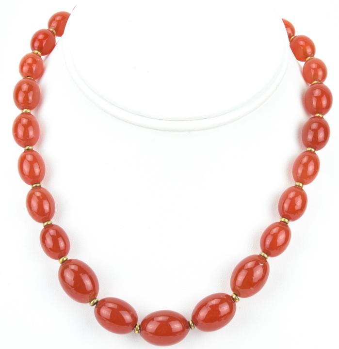 Antique Graduated Size Carnelian on Chain Necklace: Antique Graduated Size Carnelian on Chain Necklace. Graduated size carnelian beads strung on gold filled chain and with gold filled spacers / clasp. Measures 16.25 inches in length, largest bead is .7