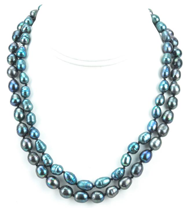 Pair Hand Knotted Tahitian Black Pearl Necklaces: Pair Hand Knotted Tahitian Black Pearl Necklaces. Hand knotted on black silk thread. Baroque form Tahitian high luster pearls with iridescent tones of black, silver, gray. Each measures 18 inches in l