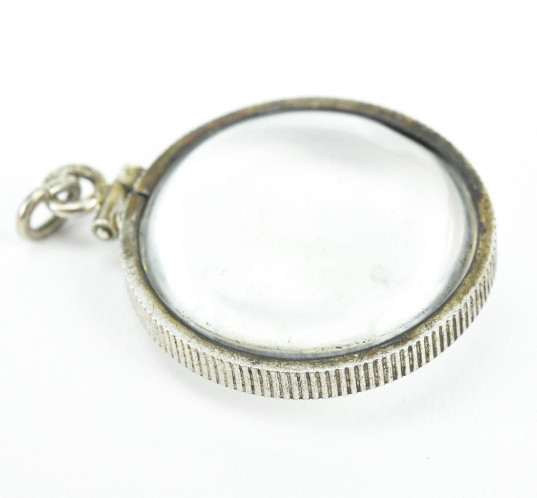 Antique Sterling Silver Framed Magnifying Locket: Antique Sterling Silver Framed Magnifying Locket Necklace Pendant. Hallmarked. Measures 1.25 inches in length.