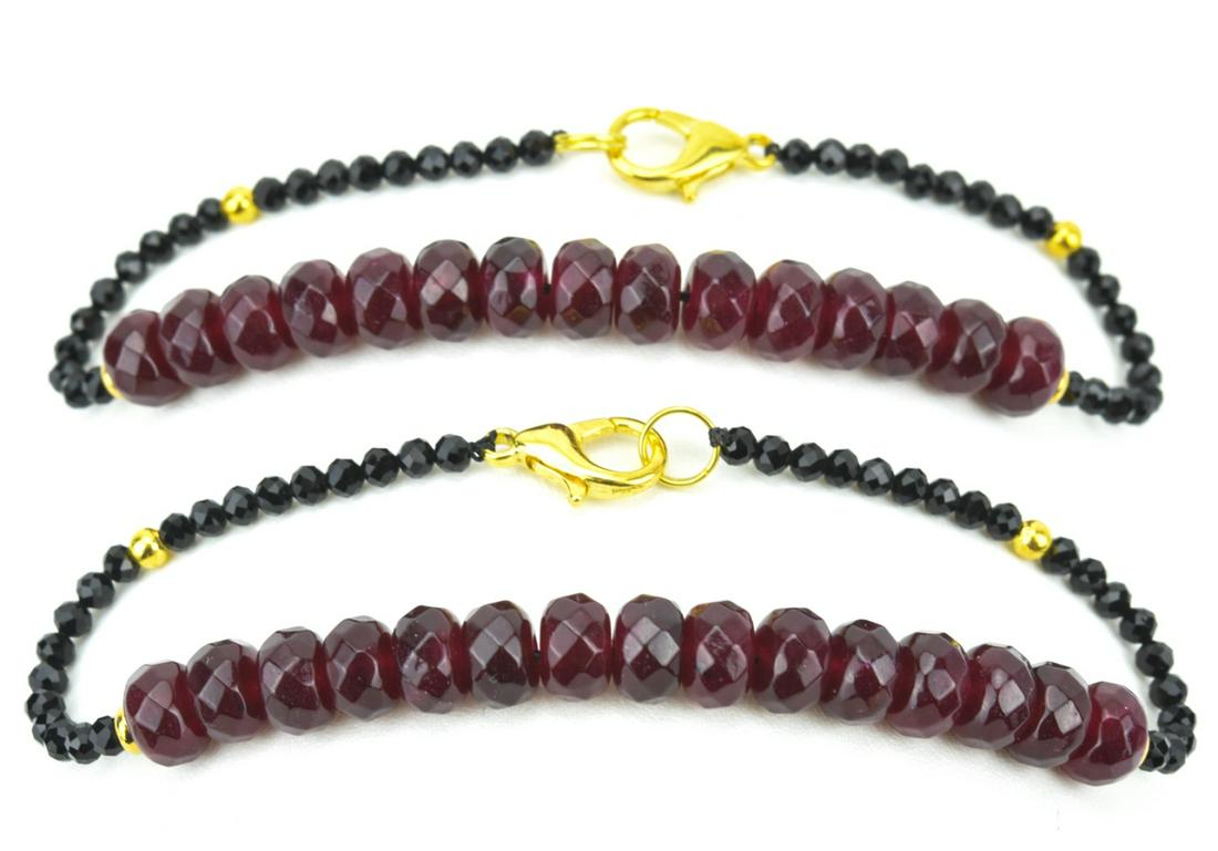 Pair of Bracelets w Faceted Ruby Beads: Pair of Bracelets w Faceted Ruby Beads. Each with fifteen faceted rondelle form ruby beads. Each measures 8.25 inches in length.