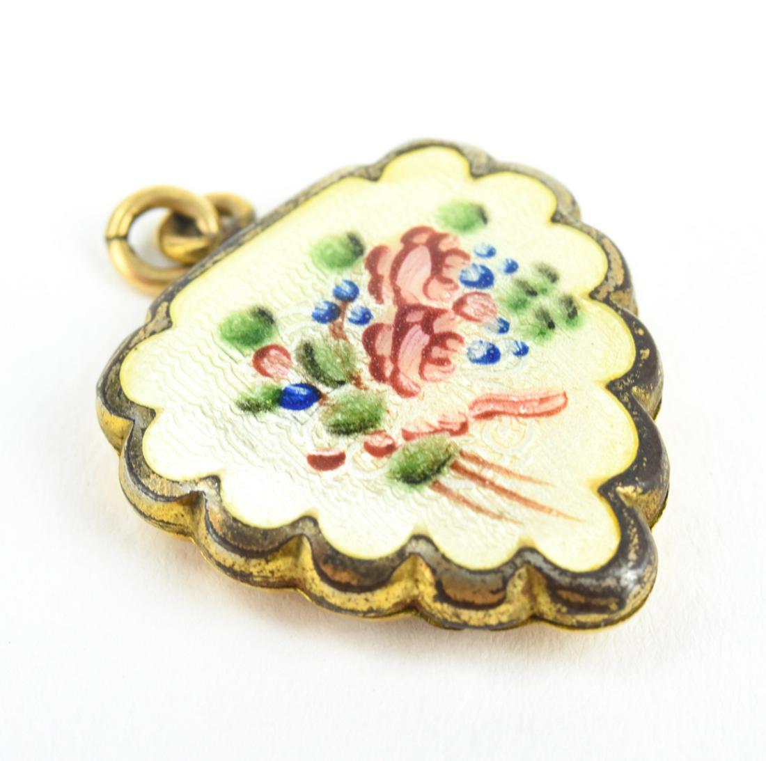 Antique Guilloche Enamel Heart Locket Pendant: Antique Guilloche Enamel Heart Locket Pendant. Floral motif. Gold tone. Measures just over 1 inch in length.