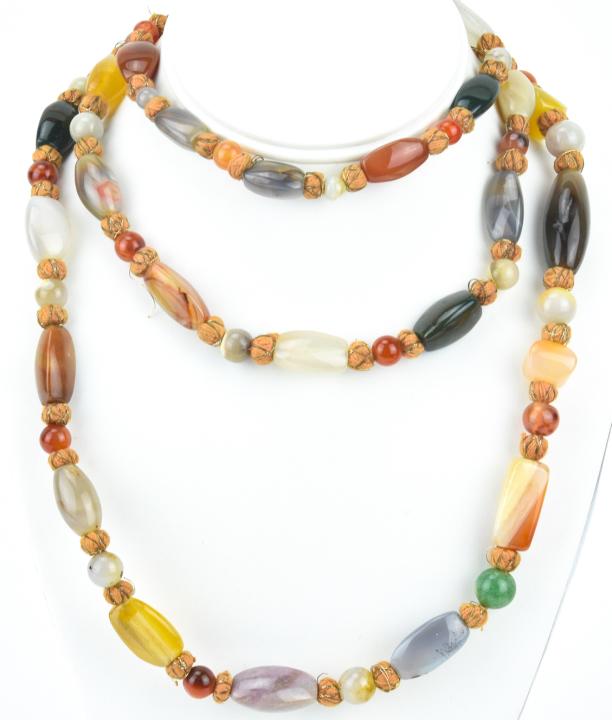 Opera Length Necklace w Specimen Agate Beads: Opera Length Necklace w Specimen Agate Beads. Beads include agate, carnelian and hardstone. Measures 53 inches in length.