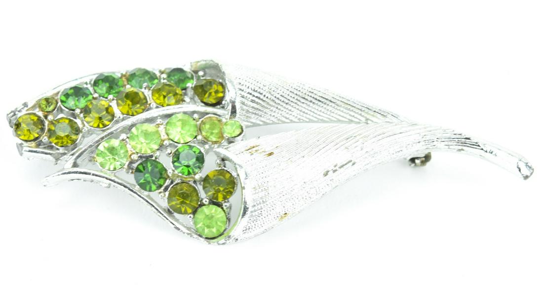 Vintage Costume Jewelry Cornucopia Brooch by Coro: Vintage Costume Jewelry Cornucopia Brooch by Coro. Signed. Set with multi color rhinestones. Measures 3 inches in length.