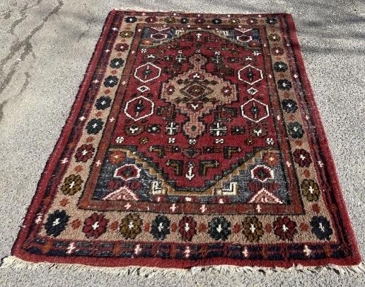Hand Knotted Wool Turkish Area Rug: Hand Knotted Wool Turkish Area Rug. Measures 72 inches high x 47 inches wide.