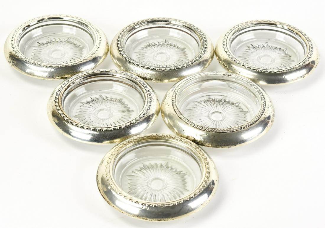 Collection of Antique Sterling & Glass Coasters: Collection of 6 Antique Sterling & Glass Coasters. Hallmarked. Measures 4 inches in diameter.