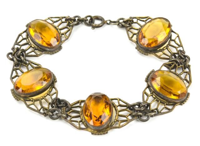 Antique Art Deco Citrine Crystal Panel Bracelet: Antique Art Deco Citrine Crystal Articulated Panel Bracelet. Likely German or Czechoslovakian in origin. Measures 7.75 inches in length.