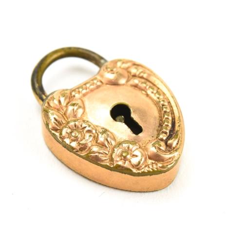 Antique Gold Filled Heart Padlock Charm / Pendant: Antique Gold Filled Heart Padlock Charm / Pendant. Scrollwork and flower motif. Measures just under 1 inch in length.