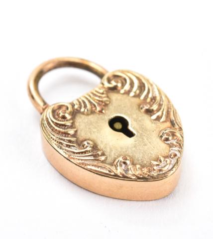 Antique Gold Filled Heart Padlock Charm / Pendant: Antique Gold Filled Heart Padlock Charm / Pendant. Scrollwork motif. Measures just under 1 inch in length.