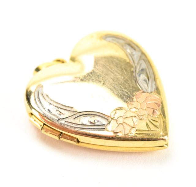 Estate Heart Form Two Tone Gold Filled Locket: Estate Heart Form Two Tone Gold Filled Locket Necklace Pendant. Measures just over 1 inch in length.