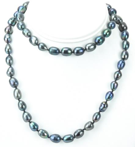 Hand Knotted Tahitian Black Baroque Pearl Necklace: Hand Knotted Tahitian Black Baroque Pearl Necklace. Opera length hand knotted black baroque pearl necklace strand with pearls of approximately 10 to 12 mm in length with high luster tones of black, gr