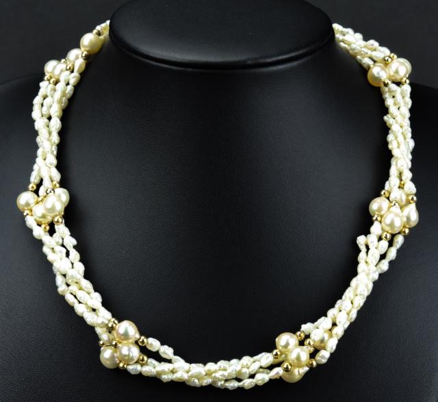 Estate 14kt Yellow Gold & Baroque Pearl Necklace: Estate 14kt Yellow Gold & Baroque Pearl Necklace. Four strand hand knotted baroque pearl necklace with 14kt yellow gold beads and filigree navette form clasp. Measures 17 inches in length.
