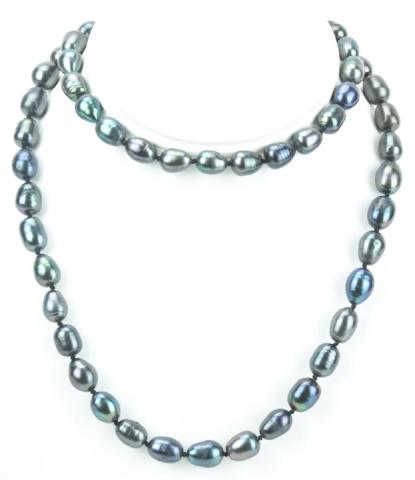 Opera Length Baroque Tahitian Pearl Necklace: Opera Length Baroque Tahitian Pearl Necklace Strand. Hand knotted on black silk thread with navette form filigree clasp featuring high luster iridescent tone baroque form Tahitian pearls with tones of