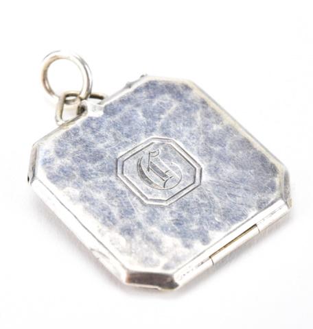 Antique Art Deco Sterling Silver Locket Pendant: Antique Art Deco Sterling Silver Locket Necklace Pendant. Having a hammered texture finish. Measures just over 1.5 inches in length.