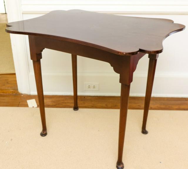 Antique Scalloped Mahogany Top Queen Anne Table: Antique English Scalloped Mahogany Top Queen Anne Table. Measures 27 inches x 32 inches x 24 inches.