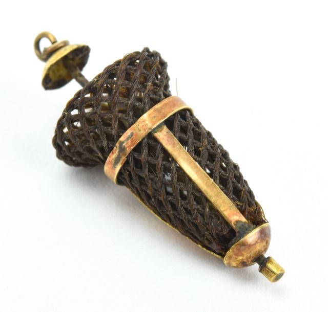 Antique 19th C Woven Hair Mourning Pendant: Antique 19th C Woven Hair Mourning Pendant w Gold Filled Setting. Measures 1.25 inches in length.