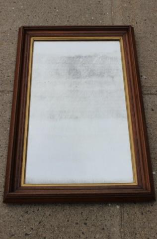 Antique Carved Eastlake Framed Mirror: Antique Carved Eastlake Framed Mirror. Measures 33.25 inches high x 21 inches wide x 1.75 inches deep.