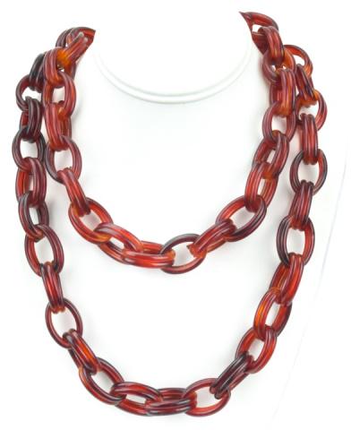 Vintage Costume Jewelry Faux Tortoise Necklace: Vintage Costume Jewelry Faux Tortoise Necklace. Double rolo link design. Measures 46 inches in overall length.