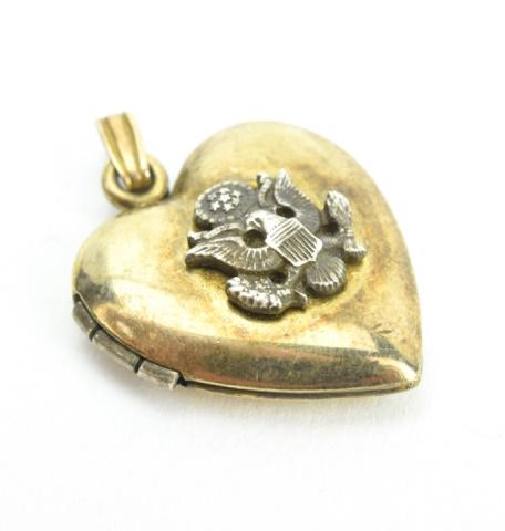 Estate WWII Era Sweet Heart Military Locket: Estate WWII Era Sweet Heart Military Locket Necklace Pendant. w Original Photos. Measures 1.25 inches in length.