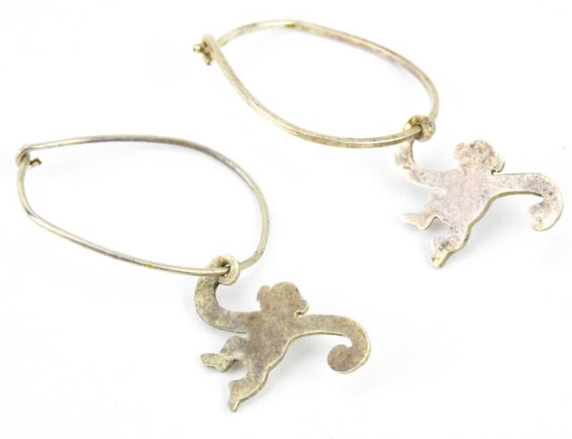Pair Vintage Sterling Silver Monkey Hoop Earrings: Pair Vintage Sterling Silver Monkey Hoop Earrings. Each measures nearly 1.75 inches in length.