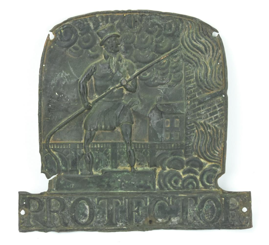 Antique 19th C Fire Marker - Inscribed Protector: Antique 19th C Fire Marker - Inscribed Protector. Showing a fire fighter putting out flames. Measures 9 x 9.5 inches.
