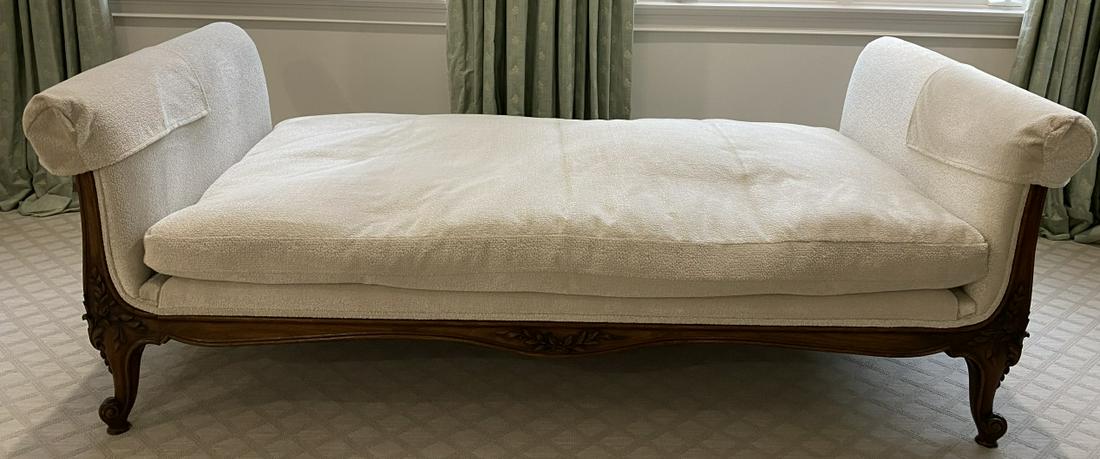 Carved French Provincial Daybed W Cream Upholstery: Carved French Provincial Daybed With Ivory Upholstery. 31 inches x 88 inches x 41 inches. Floor to seat 20 inches.