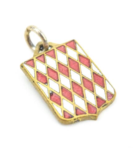 Antique Red & White Enamel Armorial Shield Pendant: Antique Red & White Enamel Armorial Shield Pendant / Charm. Measures .75 of an inch in length.