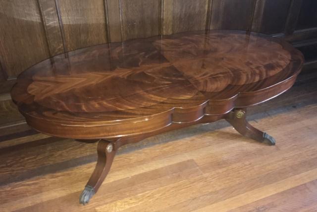 Duncan Phyfe Style Burled Wood Coffee Table: Duncan Phyfe Style Burled Wood Coffee Table. Having a book matched burled wood top and pedestal base. Measures 17 x 49.5 x 25.5 inches.