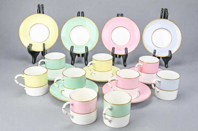 Set 9 Royal Worcester Demitasse Cups & Saucers: Set 9 Royal Worcester Bone China Demitasse Cups & Saucers. In an assortment of colors. Marked on bottom. Together measures 3 inches high x 5 inches in diameter.