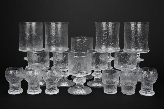 Mid C Tapio Wirkkala Iittala Finland Drink Ware: Mid Century Tapio Wirkkala Iittala Finland "Senaattori" Drink Ware. Includes five cups, one water glass, four wine glasses, and six shot glasses. Small cup measures 4.50 inches x 2.75 inches.