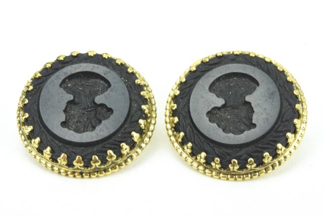 Pair Whiting & Davis Costume Jewelry Earrings: Pair Whiting & Davis Costume Jewelry Earrings. Gilt metal, clip on, intaglio glass panels with portraits of ladies. Signed. Each measures 1 inch in diameter.